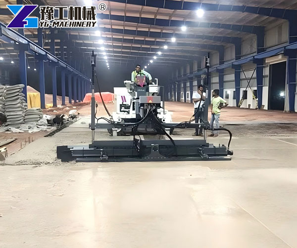 Mobile concrete screeding machine on factory floor