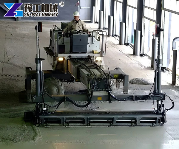 Operator using concrete laser screed machine indoors