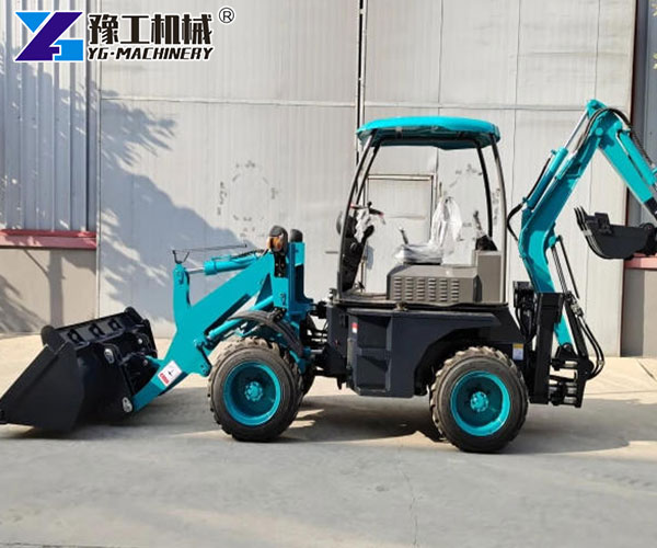 Mini backhoe loader loading sand