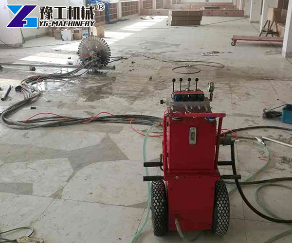 Wall saw cutting reinforced concrete