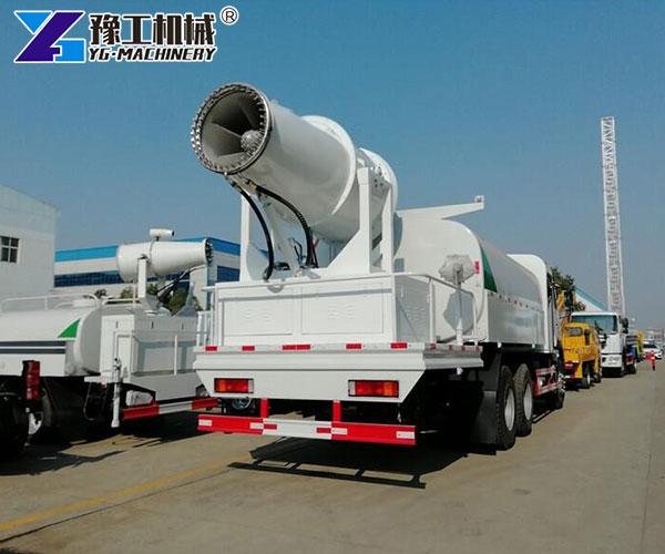 Industrial dust control truck at a construction site